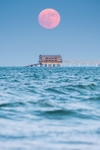 z4178 The rising Strawberry Moon over Bembridge Lifeboat Station