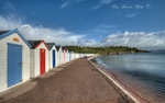 TQ55 - Clouds gather over the Beach Huts at Broadsands