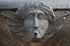 Fountain, cherub relief with spout