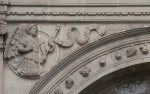Façade portal, left spandrel relief
