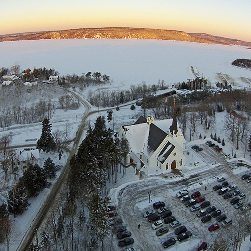 Our Lady of Perpetual Help can be seen in the foreground of this aerial image with the RYC, Kennebecasis River, and L…