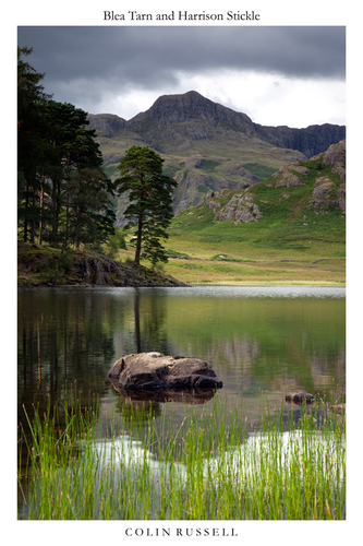 The wonderfully photogenic Lake District Langdale Pikes viewed from the popular Blea Tarn.