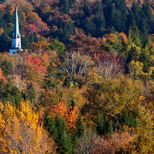 The steeple of Trinity church in Kingston, New Brunswick stands out amongst the color of the season.