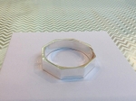 Silver hexagon shaped bangle.   £160.00