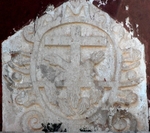 SS Pedro y Pablo, façade gable relief, Franciscan insignia