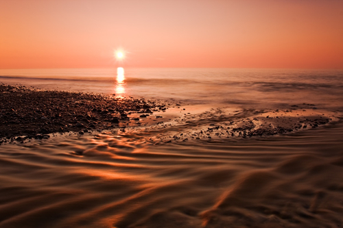Setting sun at The Lhen as the river meets the sea. Plenty of ND filters to get a long exposure in bright conditions…
