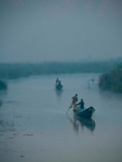Inlay Lake leg rowers at dawn