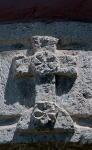 Santiago Apóstol, cloister arch keystone, cross