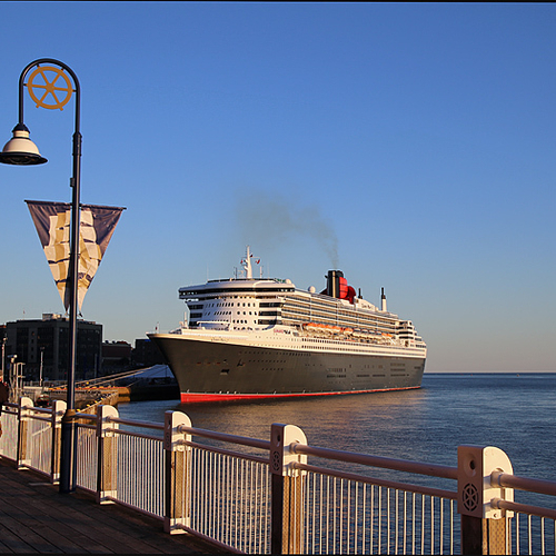 Ship peepers begin to gather along the boardwalk, as Cunard's QM2 prepares to depart the Port of Saint John, New Brun…