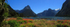 Panorama of Milford Sound showing Mitre Peak, The Lion & Mills Peak