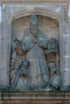 Relief, St. Augustine protecting his congregation