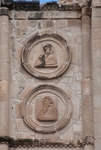 San Juan Bautista, façade, top tier, left side roundels