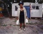 Margaret's Niece, with Water Jugs, Mississippi, 2005