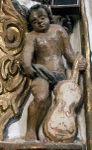 Nave wall, musical cherub