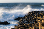 Waves batter the Giants Causeway, County Antrim.