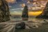 Sunset at Hidden Cove at Copper Coast Drive, Ireland.