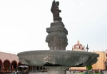 Zócalo fountain, wellspout & statue of St. Raphael