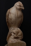 Karma - Buzzard on human scull sculpture.