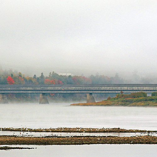 The longest covered bridge in the world crosses the St. John river at Hartland, New Brunswick.