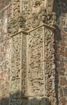 Chancel arch, left pilasters relief