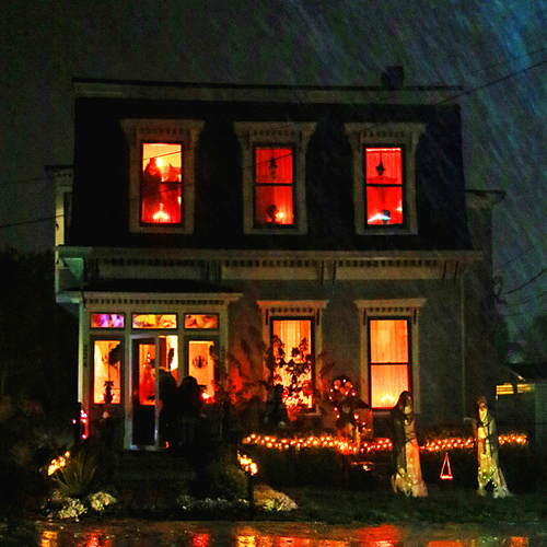 A dark and stormy All Hallows' Eve adds to the ambience of this fully decorated abode.