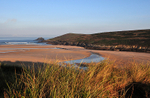 Golden morning light just after sunrise at Crantock