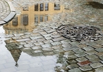 Riga-reflection and manhole cover