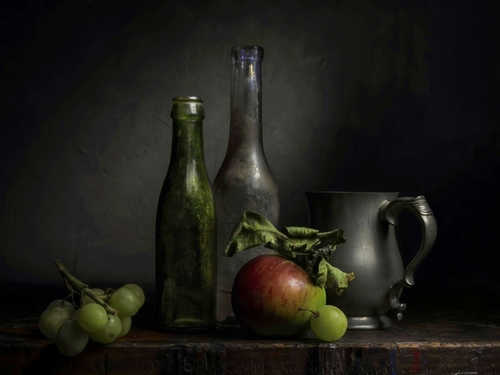 Ripe Apple. Light-painted still-life photograph featuring a newly-picked apple, grapes and some vintage items. Lit by…