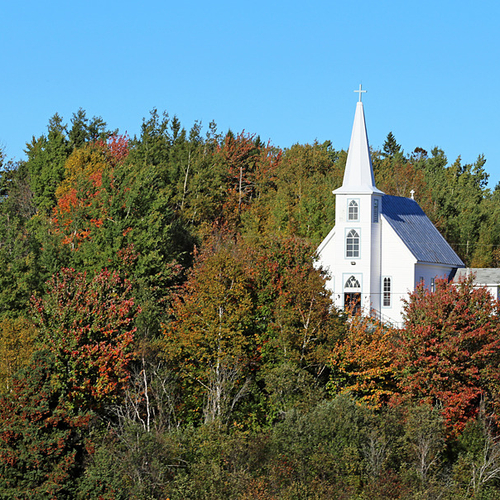 The St. James Mission Catholic Church lies within the hamlet of Kouchibouguac, New Brunswick.