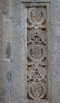 Façade portal, left pilaster relief