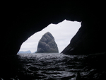 Sea Kayak shot from sea cave Boreray