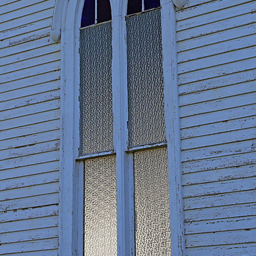 A stained glass window in the Central Hampstead Baptist Church. The architecture dates back to 1867.