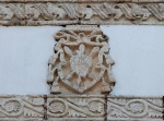 Upper façade, Augustinian insignia
