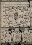 Façade strapwork with Chichimec archer & Canephori (left)
