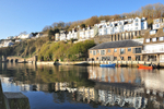Early morning reflections on The River Looe and The Sardine Factory