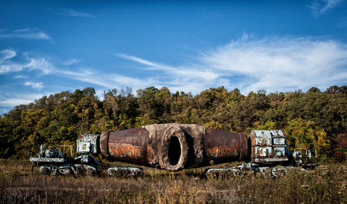 This strange looking piece of equipment is called a torpedo car. It was used to transport molten pig iron from the Ca…