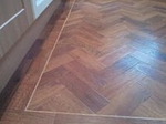 AP02 Auburn Oak Parquet in herring bone effect
