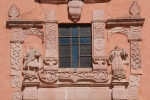 San Juan Bautista, façade portal architrave finial sculptures