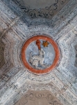 Lower cloister walk, ribbed vault boss relief, Dominican dog