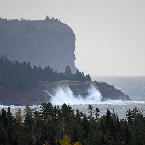 Storm surge waves lash the Fundy coast @ St. Martins, New Brunswick, Canada.