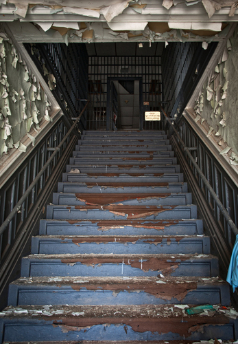 Photo of stairway leading to main lobby. Essex County Jail Annex, Caldwell NJ. 2008. Photograph by Matthew Christophe…