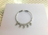 Silver sea shell design bangle.   £78.00