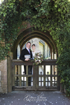 Bride & Groom at Gate at Wedding at St. Hilary