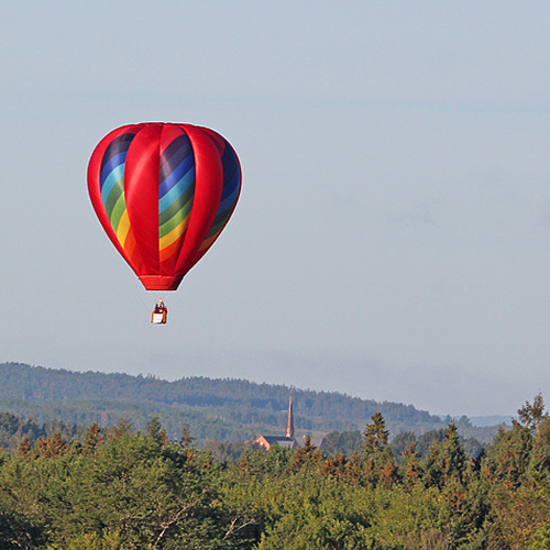 A single hot-air balloon drifts eastward from Princess Louise Park on Saturday, September 7th, 2013