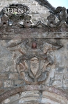 San Andrés, NW posa, S façade, Passion angel with Franciscan insignia