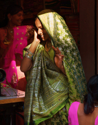 Deogarh, Rajasthan - bride being fitted for her wedding sari