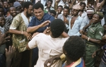 Ali spars in the street in Lagos
