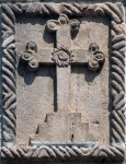 Façade entablature, cross & Franciscan cord