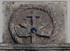 San Felipe, façade entablature, Franciscan insignia with obsidian disk
