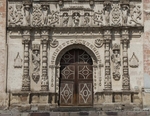 Façade, lower story & portal
